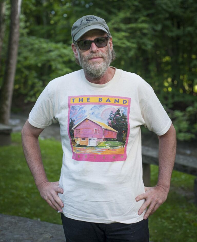 Professor Louie in a The Band t-shirt.